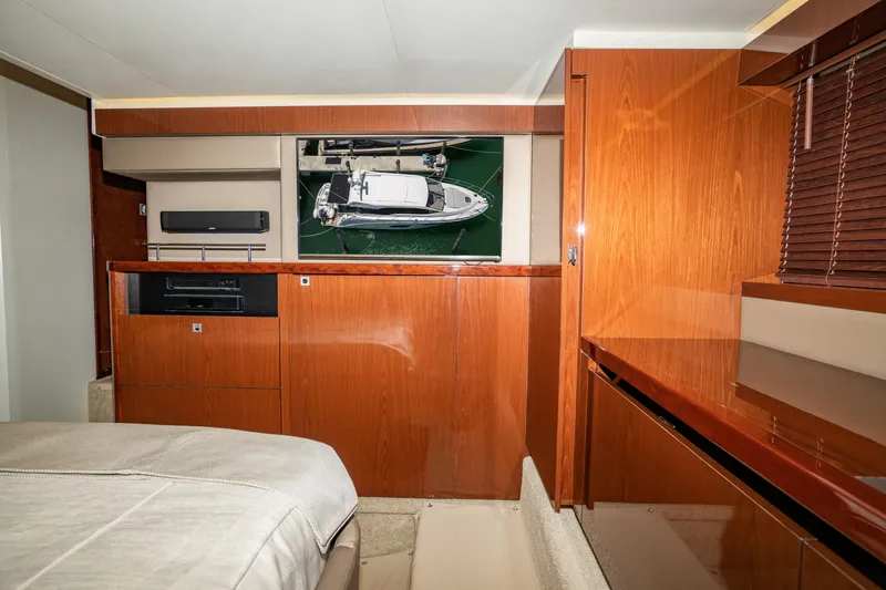 Slide: The Image of Luxurious interior of 2017 Sea Ray Sundancer 460 yacht with wood finishes and modern amenities. - 66