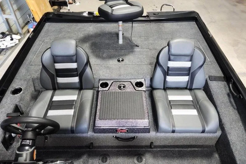 Slide: The Image of 2026 Ranger RT188P boat interior with dual seats and center console. - 10