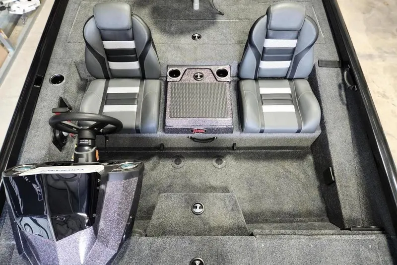 Slide: The Image of 2026 Ranger RT188P boat interior with dual seats and steering console. - 11
