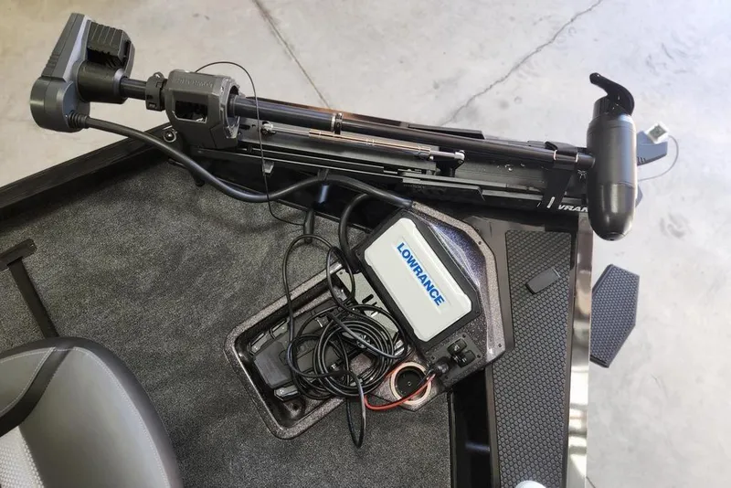 Slide: The Image of 2026 Ranger RT188P boat with Lowrance fishfinder and trolling motor setup. - 7