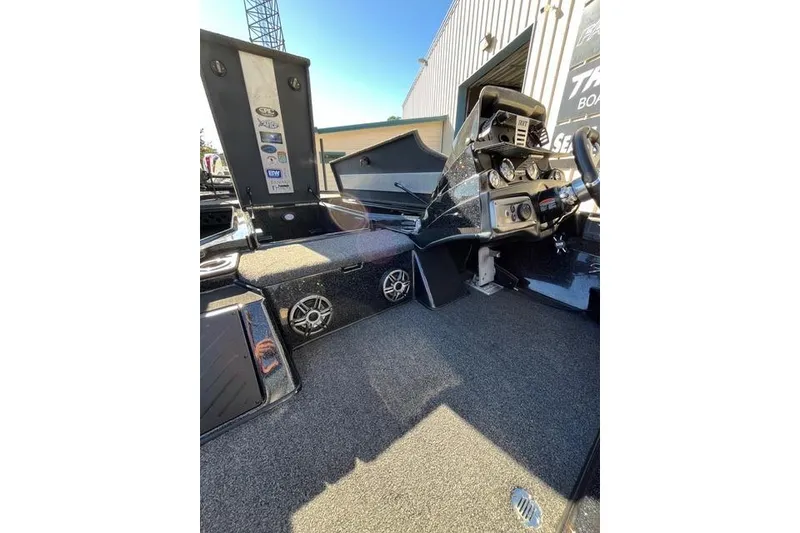 Slide: The Image of 2023 Nitro Z20 Pro boat interior with dashboard and storage compartments. - 4
