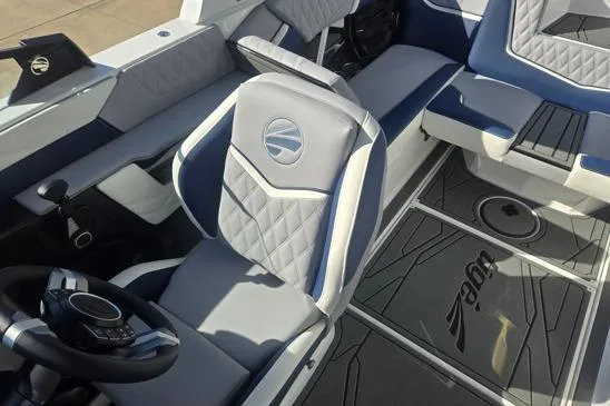 Slide: The Image of 2026 Tigé 22RZX boat interior with modern seating and steering wheel design. - 4