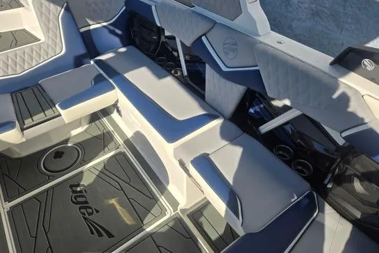 Slide: The Image of Interior of 2026 Tigé 22RZX boat with modern seating and stylish design. - 8