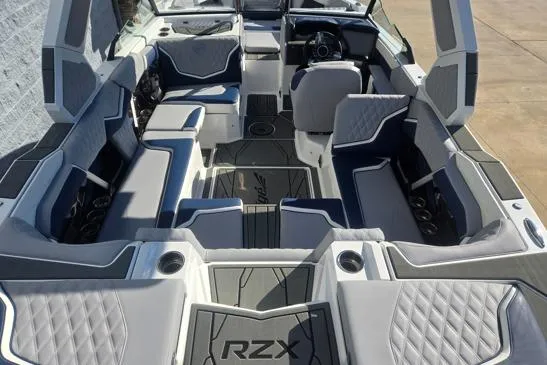 Slide: The Image of 2026 Tigé 22RZX boat interior with luxurious seating and modern design. - 9