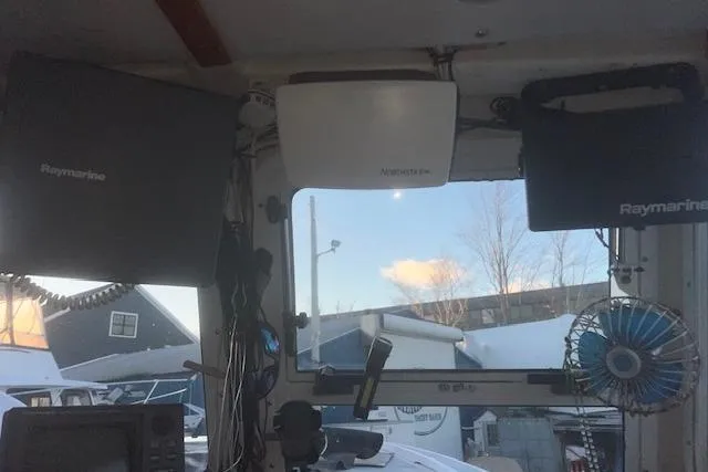 Slide: The Image of Interior view of a 2002 Libby 38 Downeast boat with Raymarine equipment. - 15