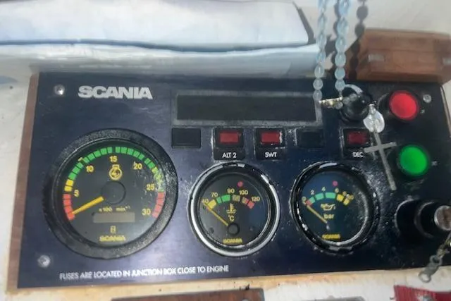 Slide: The Image of Control panel of a 2002 Libby 38 Downeast boat with Scania gauges and indicators. - 17