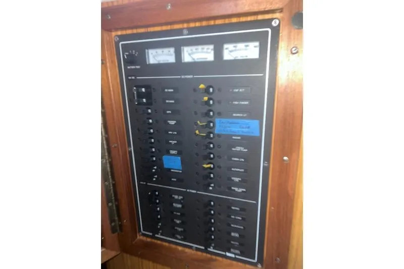 Slide: The Image of Electrical panel of 2002 Libby 38 Downeast boat with gauges and switches. - 22