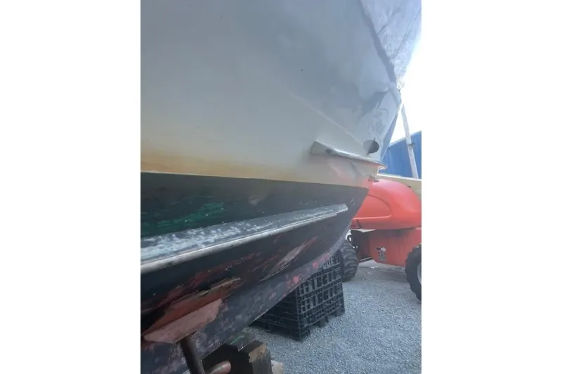 Slide: The Image of 2002 Libby 38 Downeast boat hull on dry dock, showing underside details. - 33