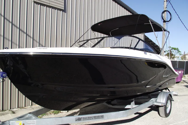Slide: The Image of 2026 Bayliner V20 boat on trailer, black hull - 1