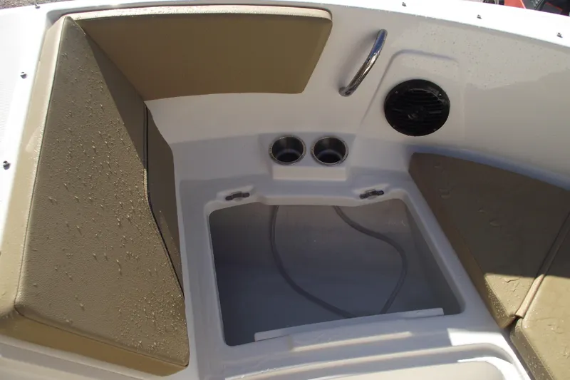 Slide: The Image of Interior of 2026 Bayliner V20 boat with seating and cup holders. - 9
