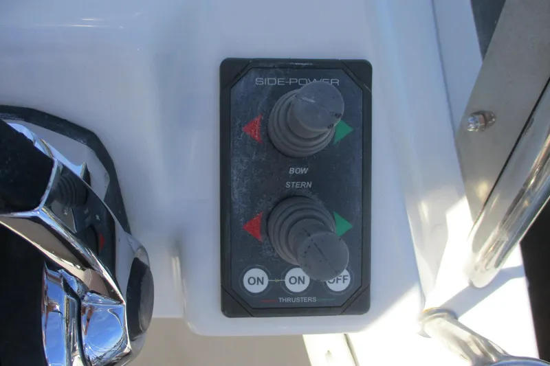 Slide: The Image of Control panel of 2015 Cutwater 30 Command Bridge LE with bow and stern thrusters. - 19