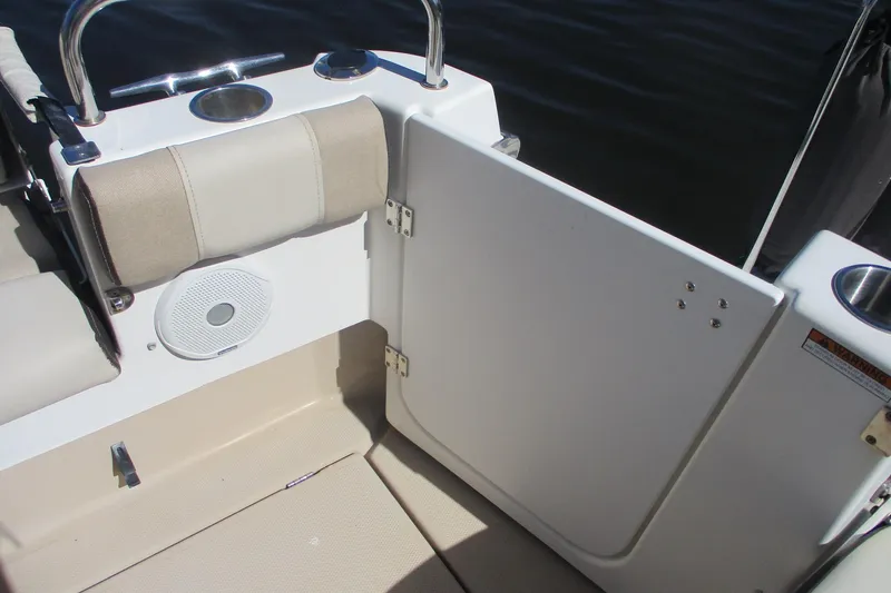 Slide: The Image of 2015 Cutwater 30 Command Bridge LE boat interior with seating and speaker. - 5