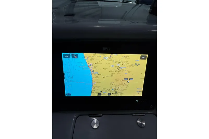 Slide: The Image of 1997 Formula 330 Sun Sport dashboard with Axiom display and compass. - 13