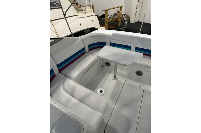 Slide: The Image of Fire extinguishers and control panel in 1997 Formula 330 Sun Sport boat interior. - 15