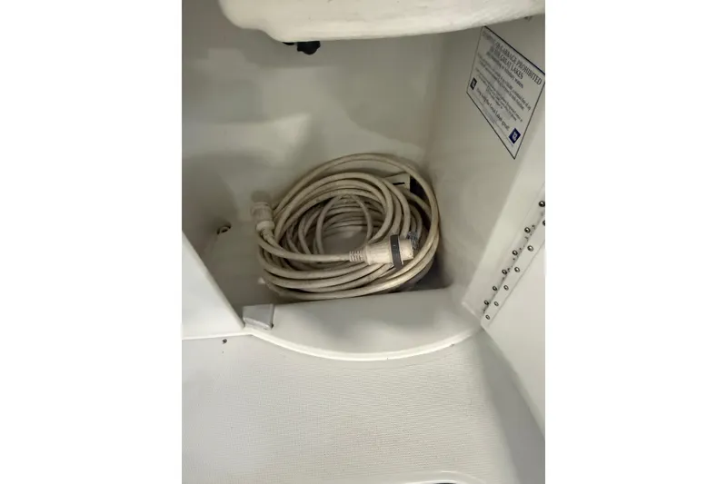 Slide: The Image of 1997 Formula 330 Sun Sport boat interior with seating and table. - 16