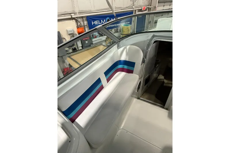 Slide: The Image of Coiled rope in storage compartment of 1997 Formula 330 Sun Sport boat. - 17