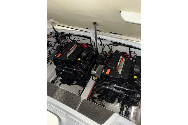 Slide: The Image of 1997 Formula 330 Sun Sport dashboard with Raymarine equipment and compass. - 34