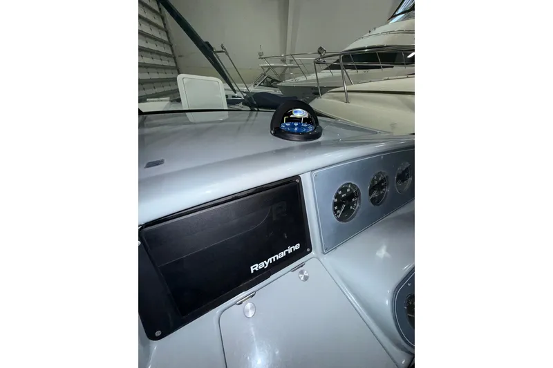 Slide: The Image of Interior cabin view of a 1997 Formula 330 Sun Sport boat. - 35