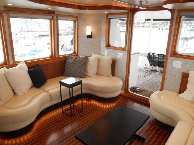 Slide: The Image of Luxurious 2005 Inace Trawler interior with elegant seating and wooden flooring. - 3