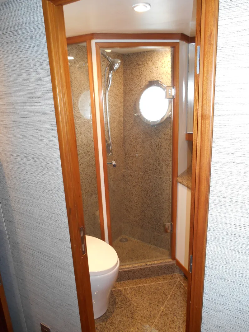 Slide: The Image of Bathroom interior of 2005 Inace Trawler with shower and porthole window. - 37
