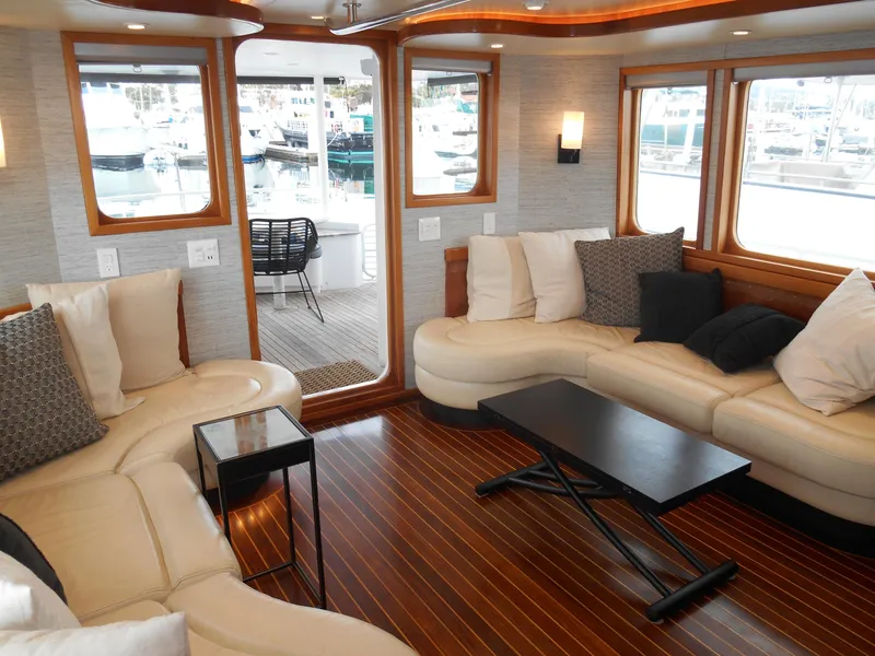 Slide: The Image of Luxurious interior of a 2005 Inace Trawler with elegant seating and wooden flooring. - 4