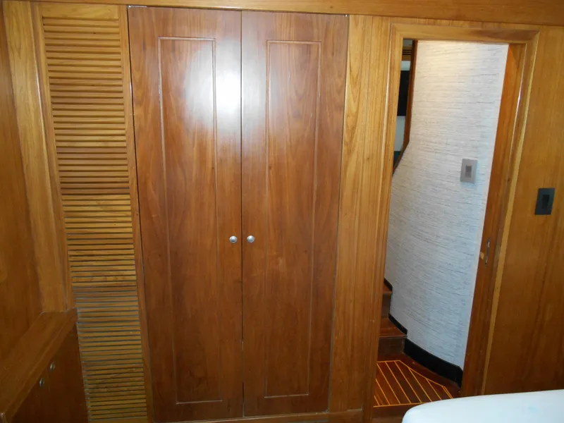 Slide: The Image of Wooden interior of 2005 Inace Trawler, featuring a closet and doorway. - 45