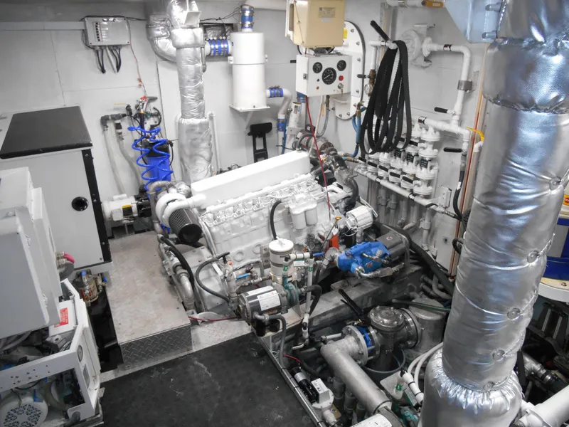Slide: The Image of Engine room of a 2005 Inace Trawler, showcasing machinery and equipment. - 48