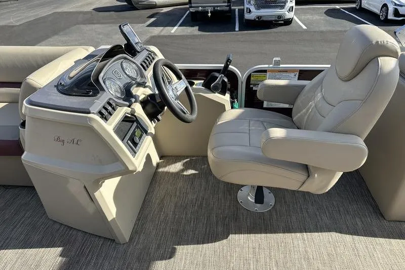 Slide: The Image of Captain's seat and helm of 2020 Sweetwater SW 2286 SB pontoon boat. - 10