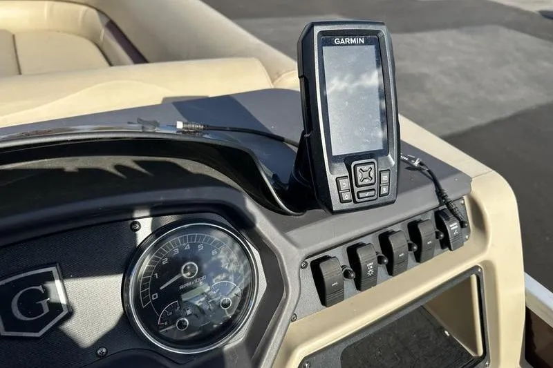 Slide: The Image of Dashboard of 2020 Sweetwater SW 2286 SB with Garmin GPS and speedometer. - 15