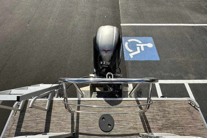 Slide: The Image of 2020 Sweetwater SW 2286 SB boat with Yamaha 115 engine near handicap parking space. - 5