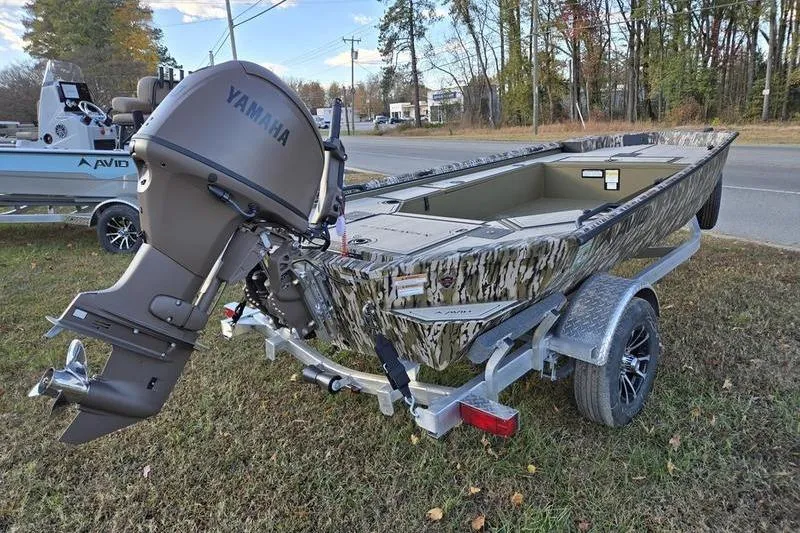 Slide: The Image of 2025 Avid 16 Commander boat with Yamaha outboard motor on a trailer. - 10