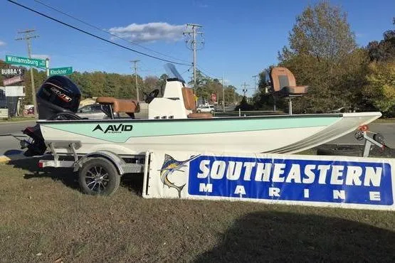 Slide: The Image of 2026 Avid 18 Rogue CC boat displayed at Southeastern Marine dealership. - 3