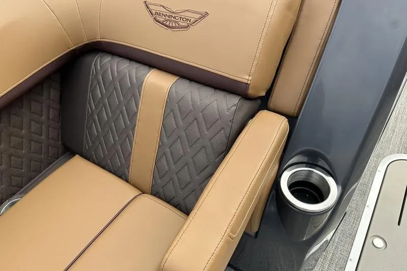 Slide: The Image of Luxurious seating on 2026 Bennington M Quad Bench 24 MSL with cup holder. - 25