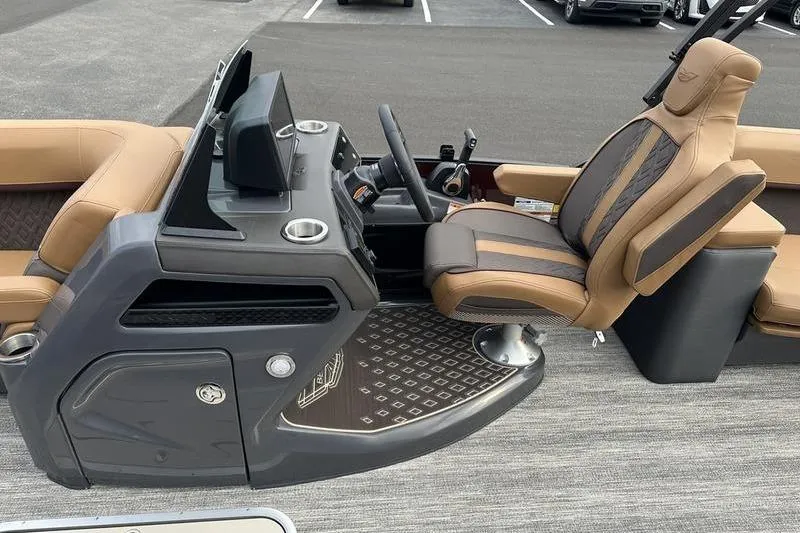 Slide: The Image of Luxurious interior of 2026 Bennington M Quad Bench 24 MSL pontoon boat. - 26