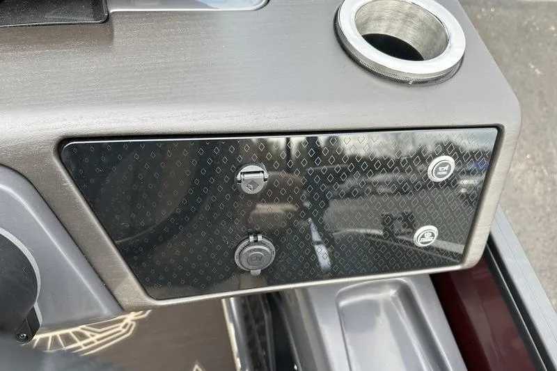 Slide: The Image of Control panel of 2026 Bennington M Quad Bench 24 MSL with cup holder. - 36