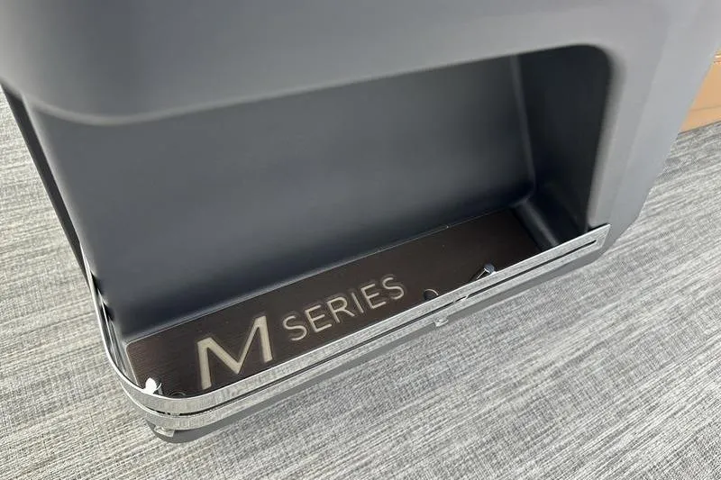 Slide: The Image of 2026 Bennington M Quad Bench 24 MSL, M Series detail on gray surface. - 40