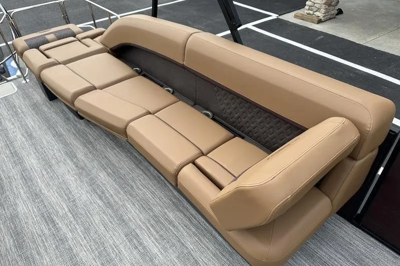 Slide: The Image of 2026 Bennington M Quad Bench 24 MSL with luxurious tan seating on a boat deck. - 46