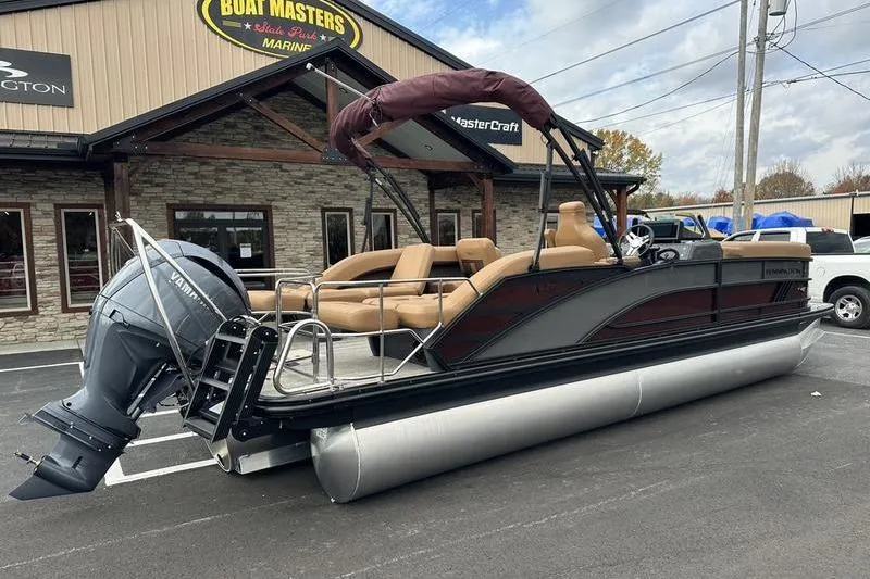 Slide: The Image of 2026 Bennington M Quad Bench 24 MSL pontoon boat at dealership. - 5
