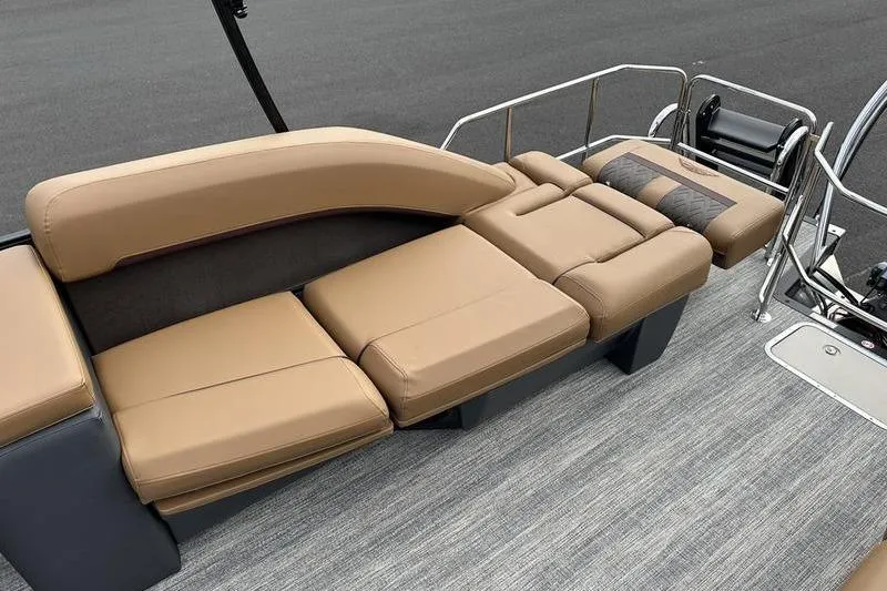 Slide: The Image of 2026 Bennington M Quad Bench 24 MSL with luxurious tan seating on a boat deck. - 50