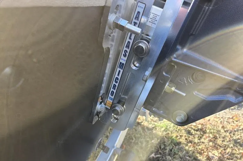 Slide: The Image of 2026 Avid 18 Commander boat deck with measurement markings and storage compartments. - 9