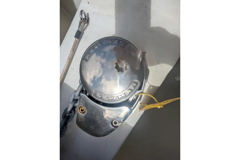 Slide: The Image of Anchor windlass on 2013 Cobia 296 Center Console boat deck. - 20