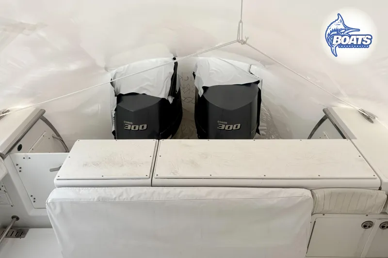 Slide: The Image of 2008 Southport 28 Express boat with twin Yamaha 300 engines, covered and stored. - 18