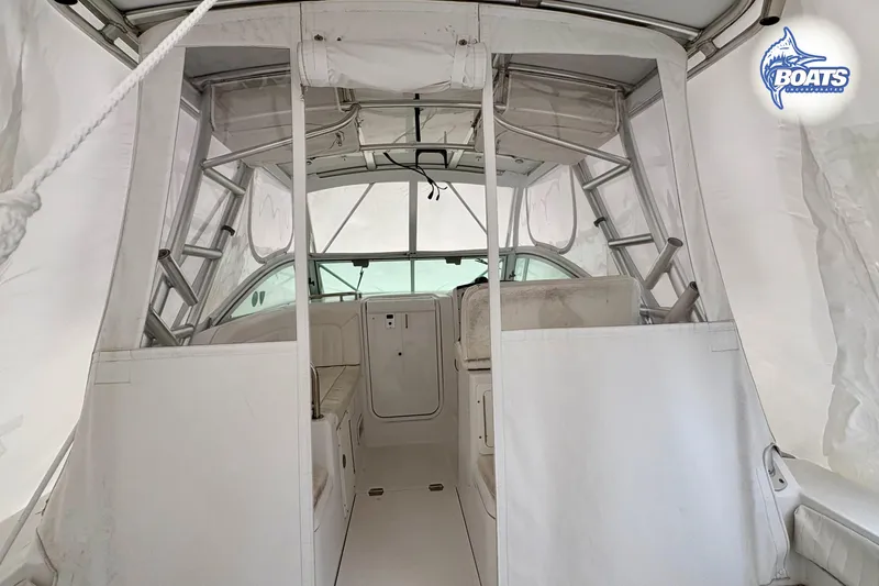 Slide: The Image of 2008 Southport 28 Express boat displayed outdoors under clear blue sky. - 3