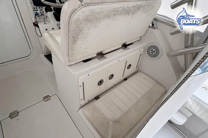Slide: The Image of 2008 Southport 28 Express boat interior with white canopy and seating area. - 6
