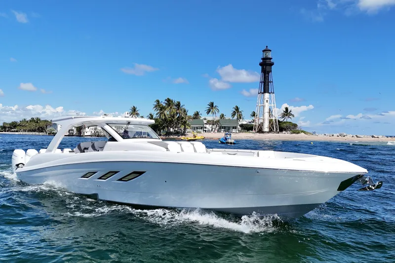 The Image of Luxury 2026 Deep Impact 499 Sport boat cruising on open water. - 0