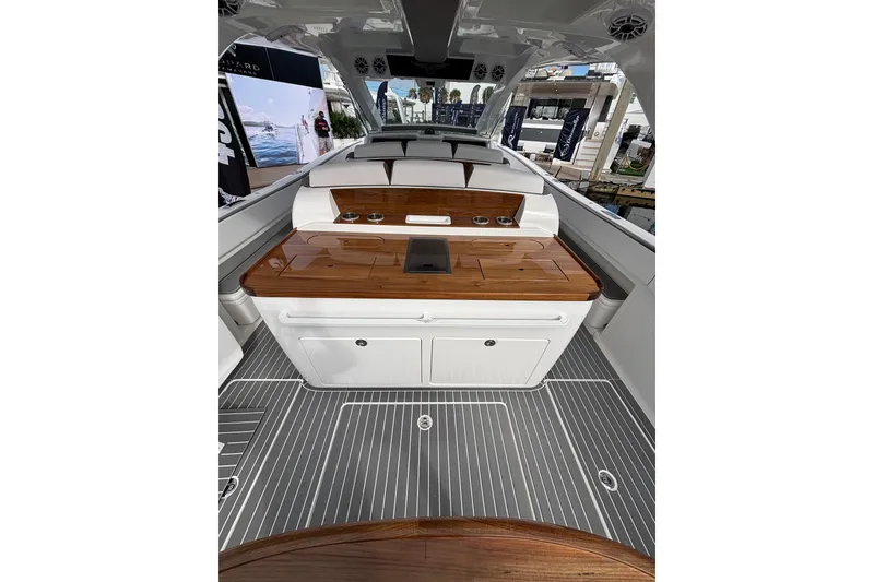 Slide: The Image of Aerial view of 2026 Deep Impact 499 Sport Luxury Edition boat on water. - 16