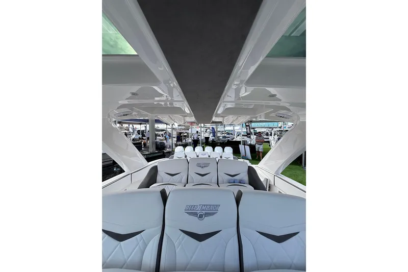Slide: The Image of Luxury 2026 Deep Impact 499 Sport boat with six powerful V10 engines on the water. - 22