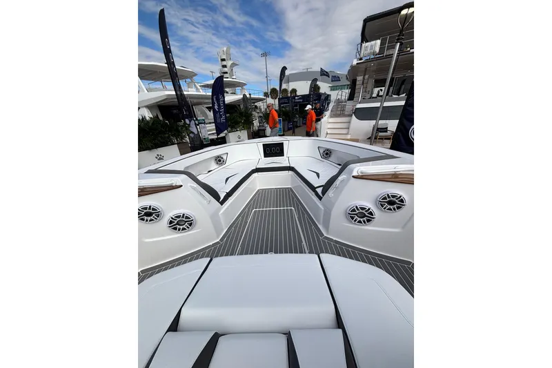 Slide: The Image of Luxury yacht deck of 2026 Deep Impact 499 Sport, featuring sleek design and wooden accents. - 24