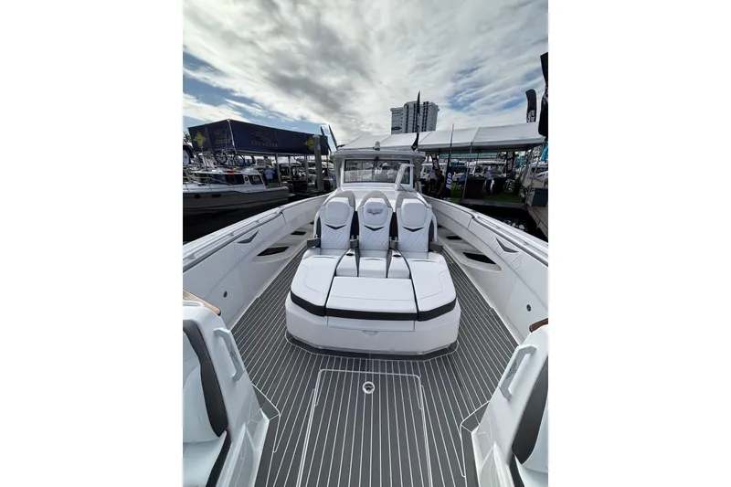 Slide: The Image of Luxury boat deck of 2026 Deep Impact 499 Sport, featuring sleek design and premium seating. - 25