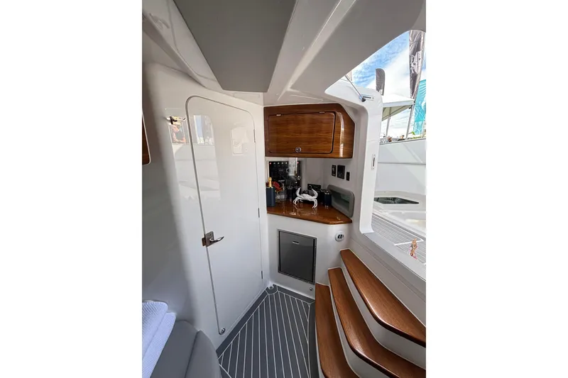 Slide: The Image of 2026 Deep Impact 499 Sport Luxury Edition with five powerful outboard engines. - 27